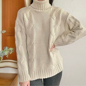 Turtleneck beige knitted sweater